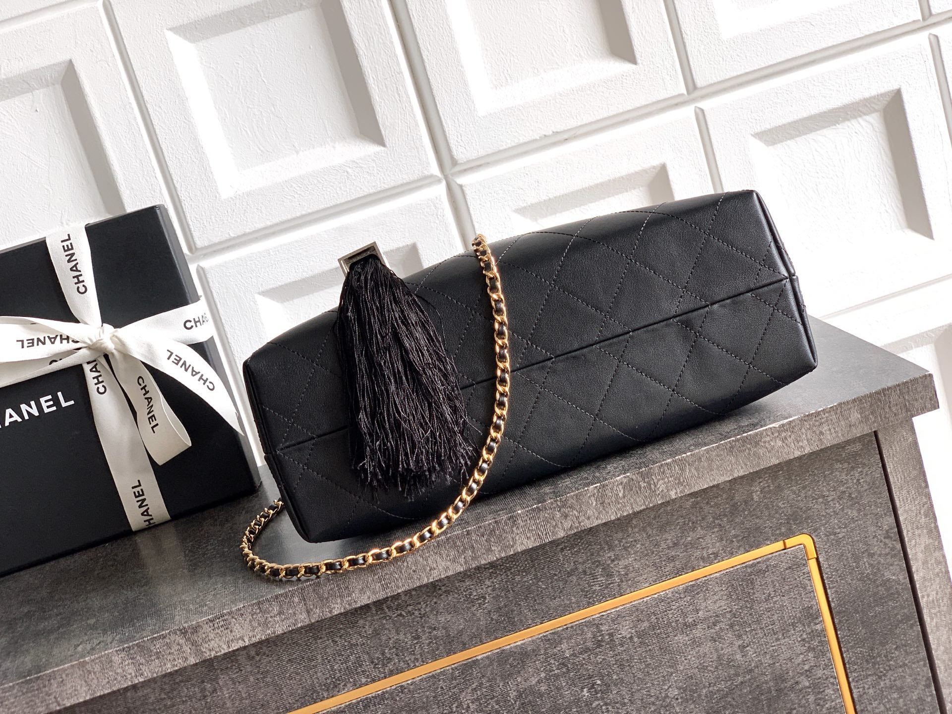 Quilted Leather Triangle Top Handle Bag