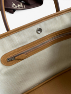 SWORD LUXURY Hermès Garden Party 30 çanta iç detayları, bej kanvas astar, fermuarlı cep ve taba rengi deri süslemeler.