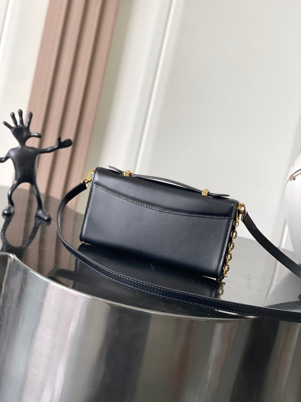 Capucines Wallet On Chain in Black Leather with Gold Chain