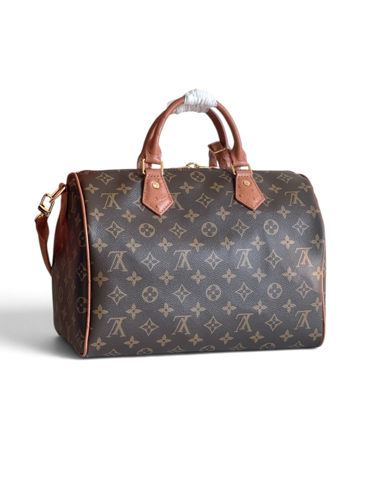SWORD LUXURY Speedy Bandoulière 30 çanta, ikonik kahverengi monogram kanvas, deri saplar ve gümüş tonlu detaylara sahip.