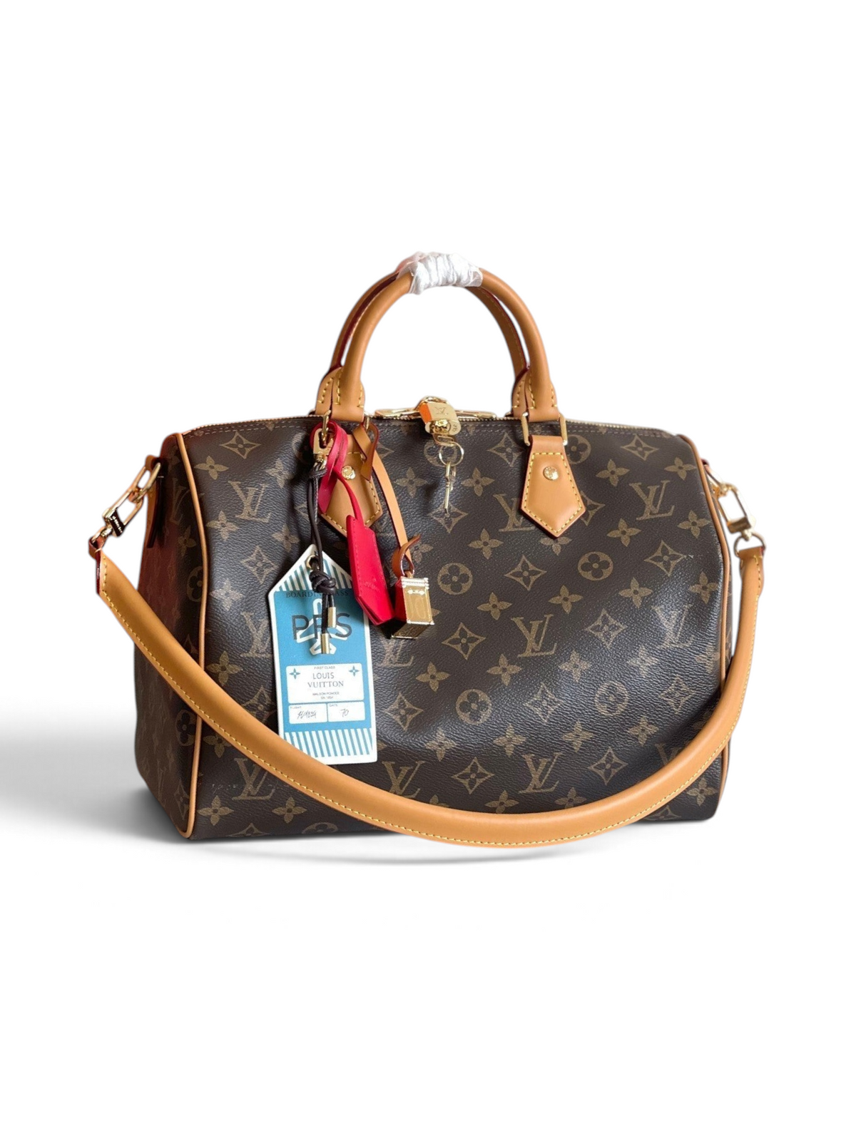 SWORD LUXURY Speedy Bandoulière 30 çanta, ikonik kahverengi monogram kanvas, deri saplar ve altın tonlu kilit detayı.