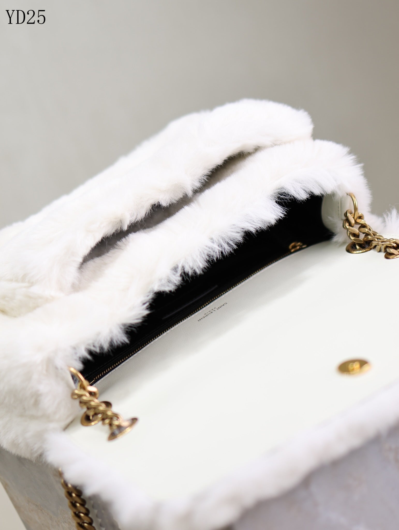 Niki Small in Shearling Bag