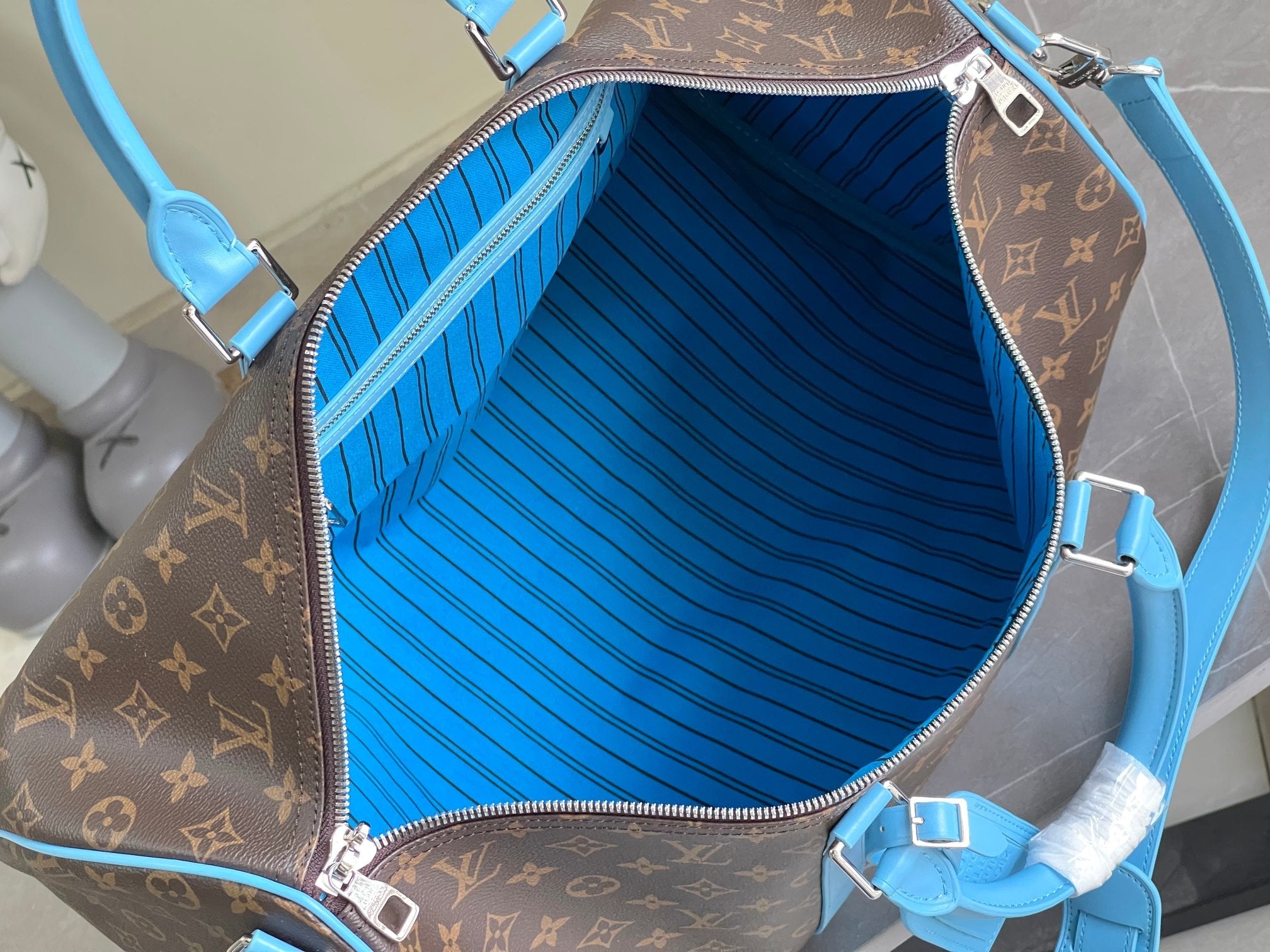 Keepall Bandoulière 50 – Monogram Canvas with Sky Blue Leather Trim
