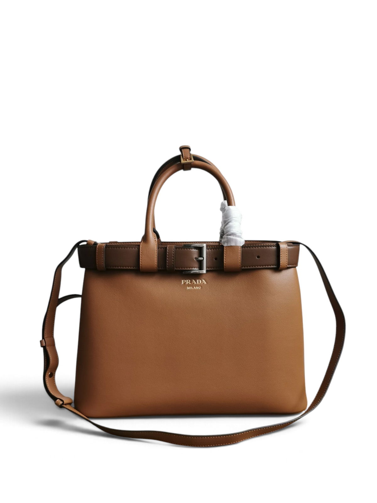 SWORD LUXURY Prada taba rengi deri tote çanta, gümüş tokalı kemer detaylı ve ayarlanabilir omuz askılı şık tasarım.