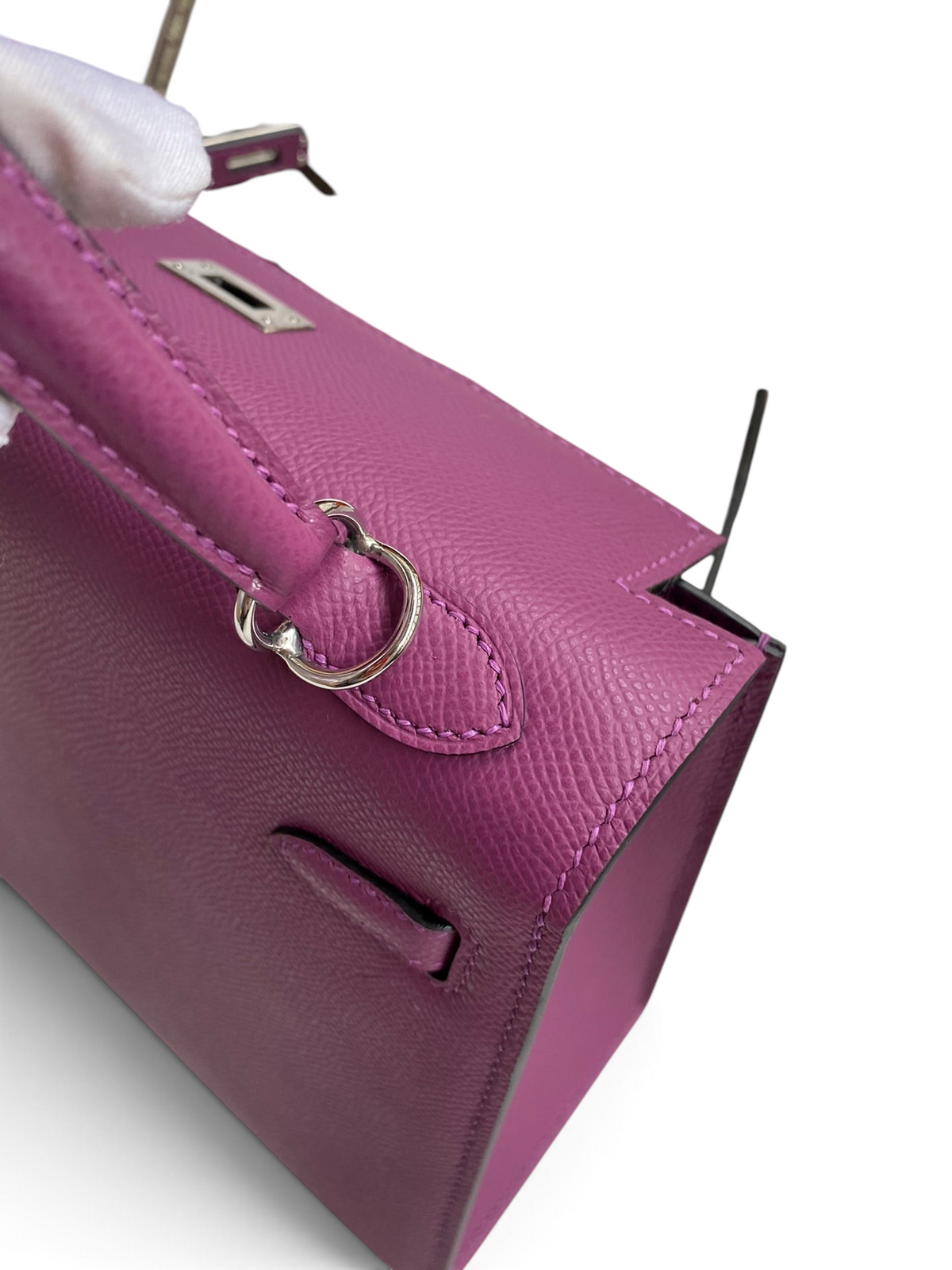 SWORD LUXURY marka, mor Epsom deri Kelly 25 çanta, gümüş donanımlı ve el dikişli detaylarıyla.