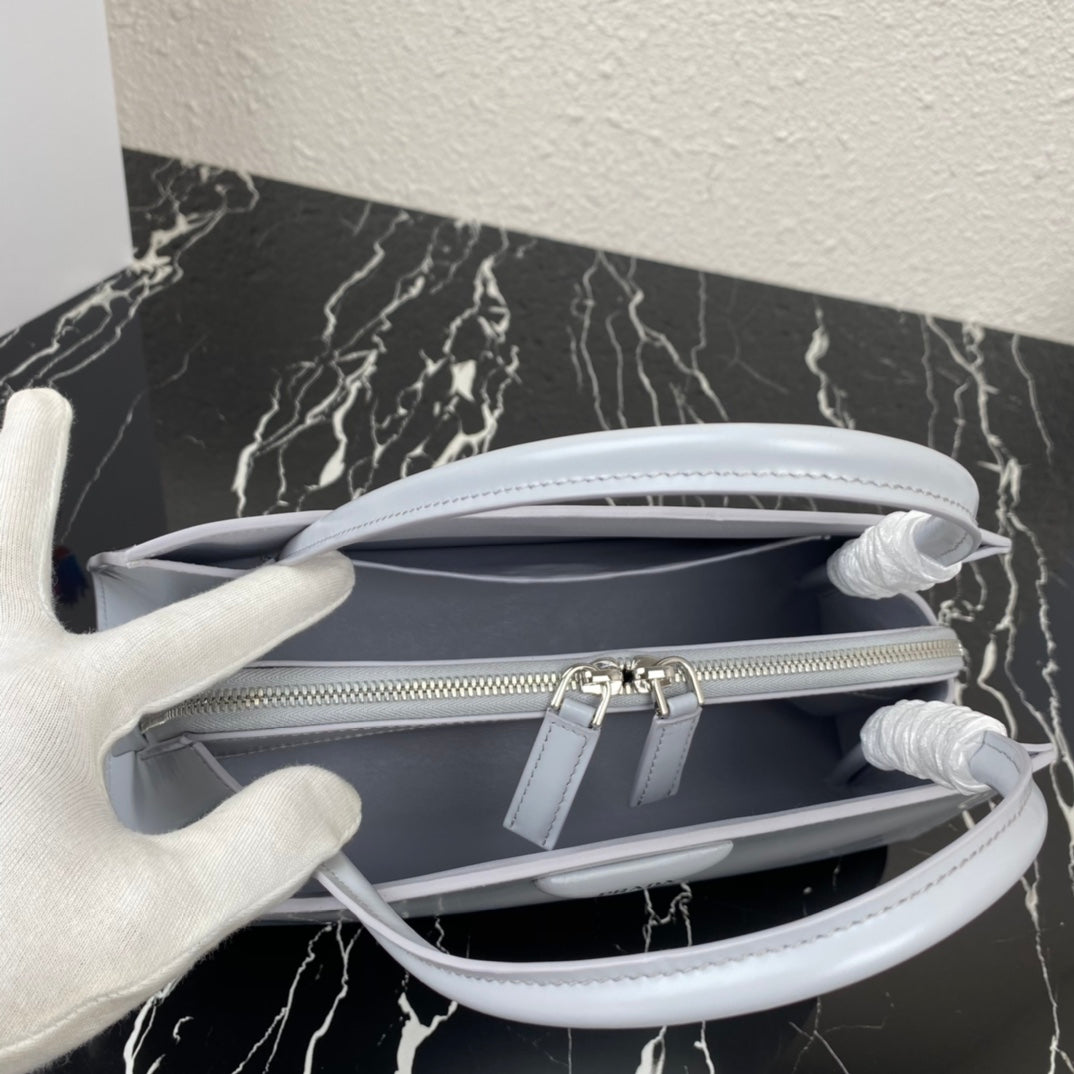 Supernova Triangle Top Handle Bag