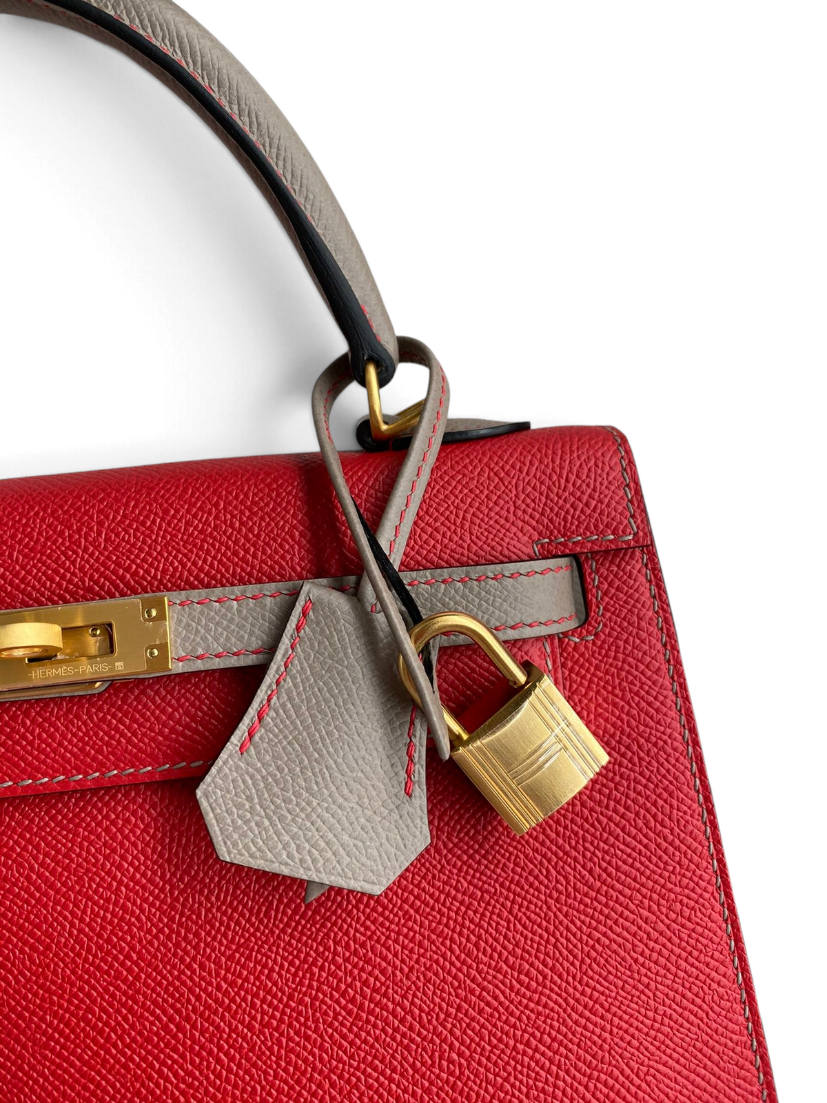 SWORD LUXURY marka, kırmızı ve gri Epsom deri detaylı, altın donanımlı ve asma kilitli Hermès Kelly 25 çanta.