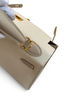 SWORD LUXURY marka, Craie ve Etoupe renkli, altın donanımlı, Epsom deri Hermès Kelly 25 çanta detayı.