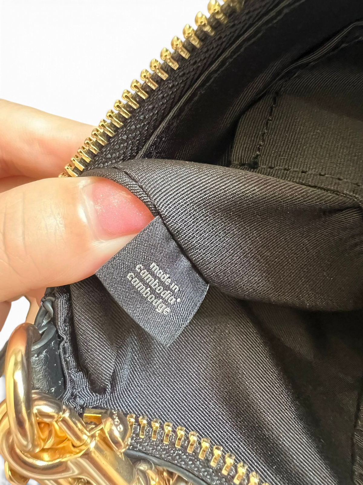 SWORD LUXURY Coach Teri omuz çantası iç astarı ve Kamboçya üretim etiketi detayı