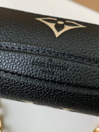 Pochette Métis East West Monogram Leather Bag