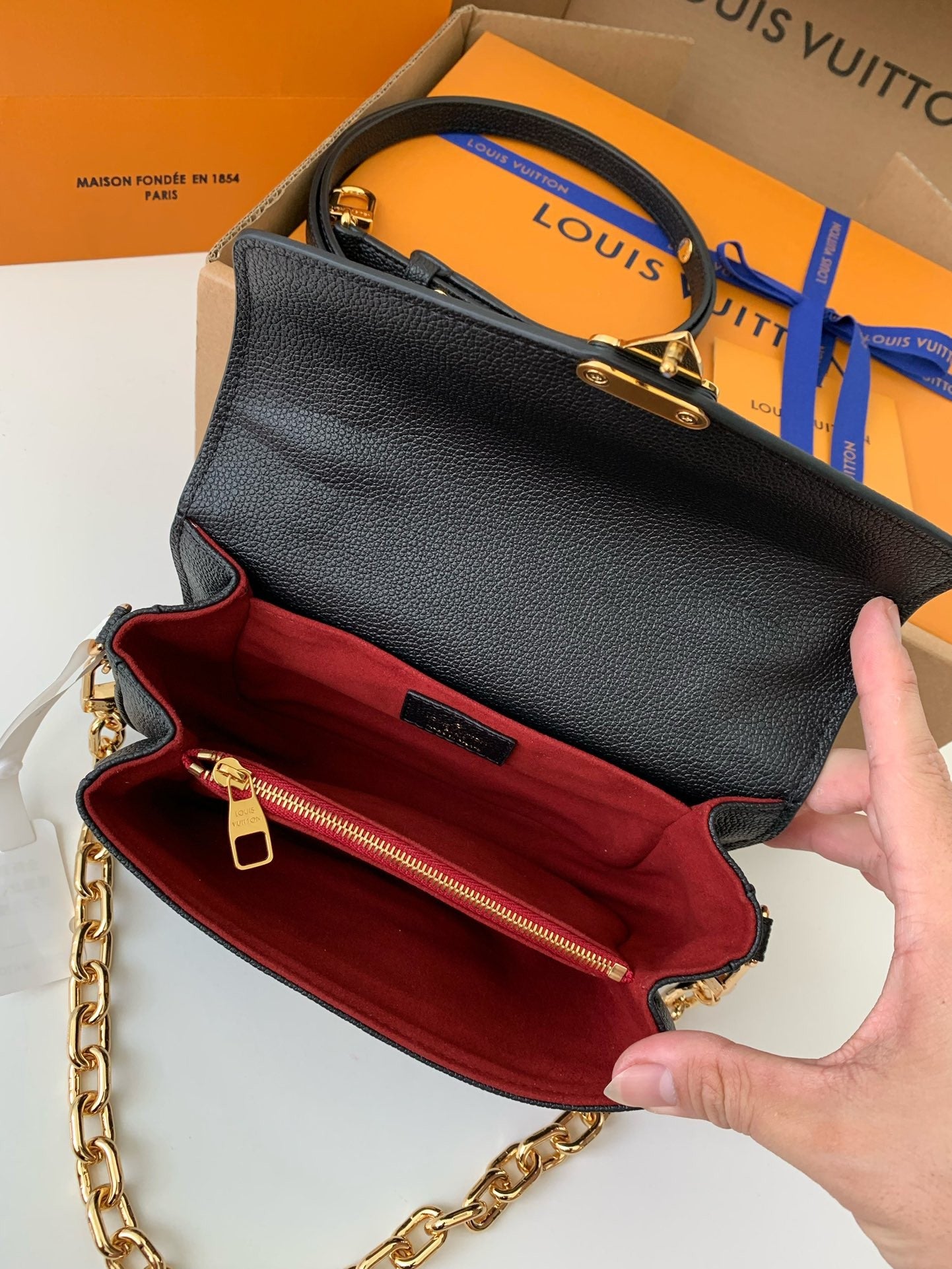 Pochette Métis East West Monogram Leather Bag