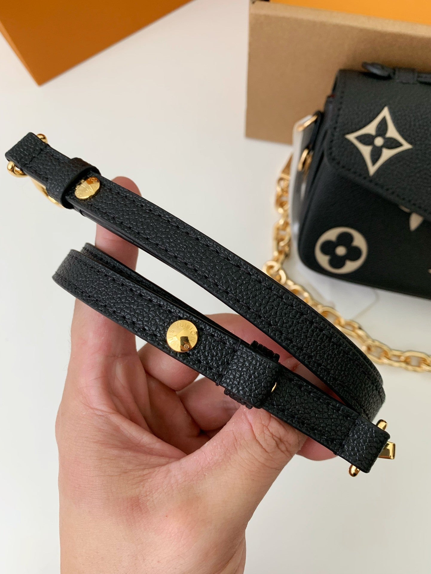 Pochette Métis East West Monogram Leather Bag
