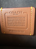 SWORD LUXURY Coach Mini Tabby çanta iç kısmında yer alan, kalite ve işçilik detaylarını içeren deri otantiklik etiketi