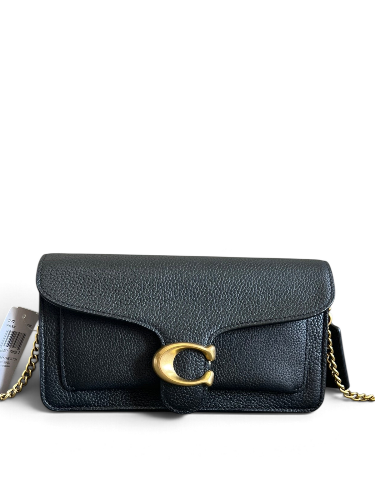 Black leather handbag with gold chain and clasp on a light gray background