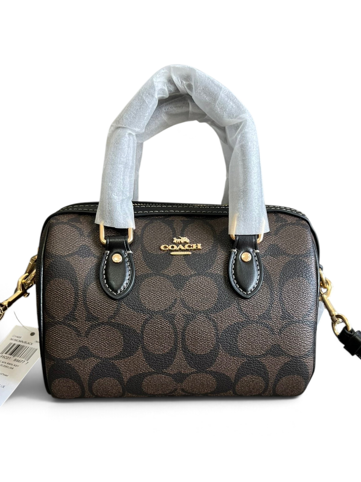 SWORD LUXURY marka, kahverengi monogram kanvas ve siyah deri detaylı, altın donanımlı şık Coach Mini Boston çanta.