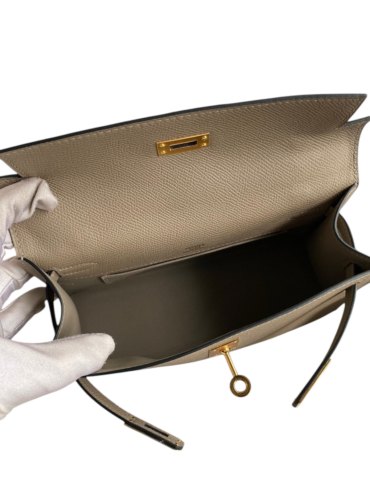 SWORD LUXURY Mini Kelly 22cm Epsom deri çanta, altın renkli döner kilit detaylı ve iç kısmı açık görünümde.