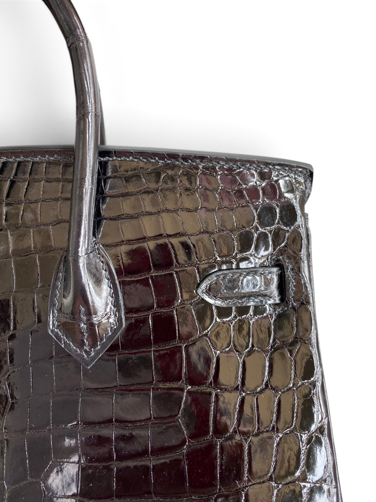SWORD LUXURY siyah timsah derisi görünümlü parlak 25cm Birkin çanta, gümüş tonlu detaylar ve zarif dikişler.