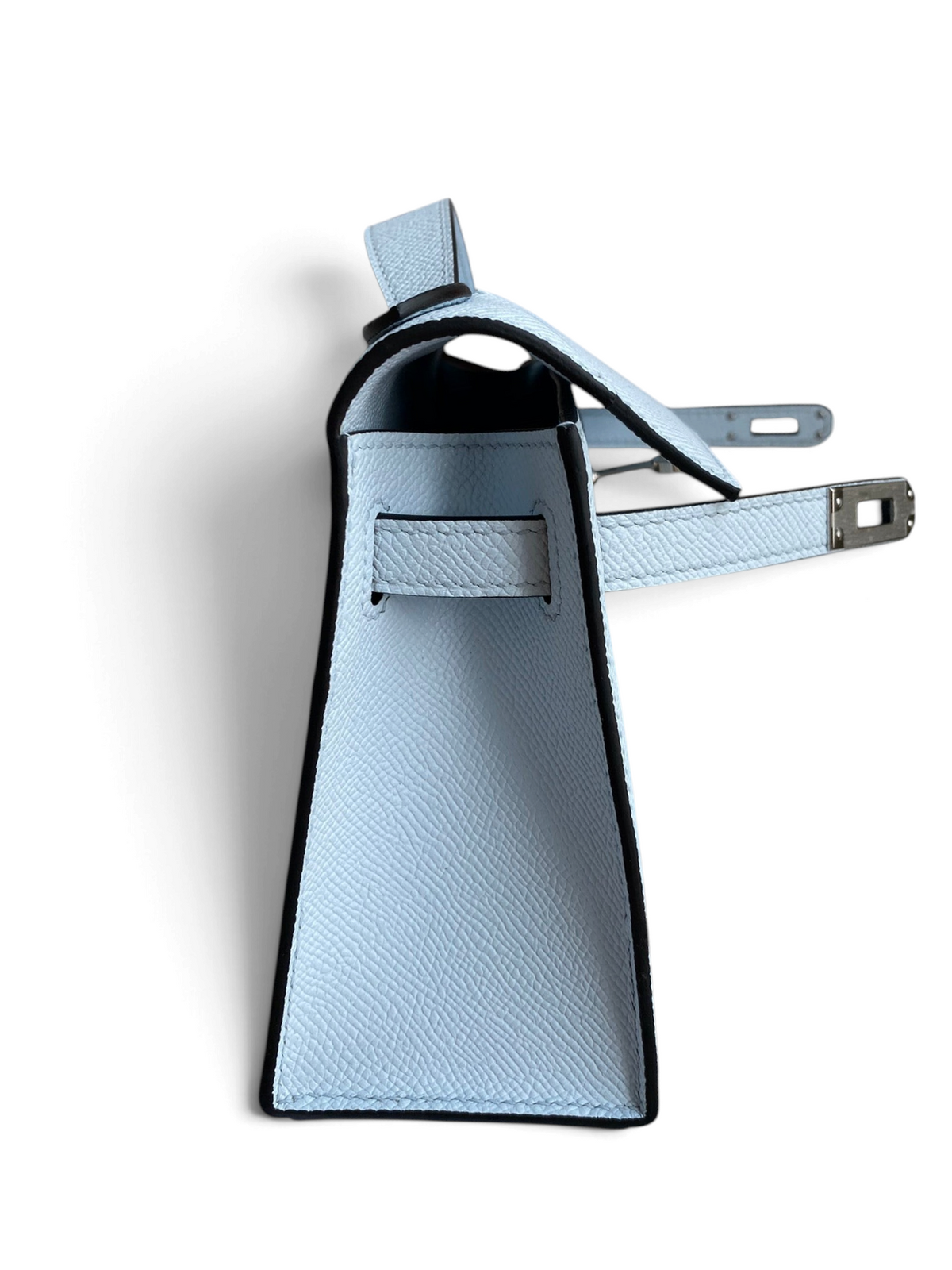 SWORD LUXURY marka, açık mavi Epsom deri, 22 cm Mini Kelly çanta, yan profil görünümü ve detaylı dikiş yapısı.