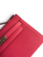 SWORD LUXURY 22 cm pembe Epsom deri Mini Kelly çanta, gümüş tonlu döner kilit detayı ve dokulu yüzeyi ile.