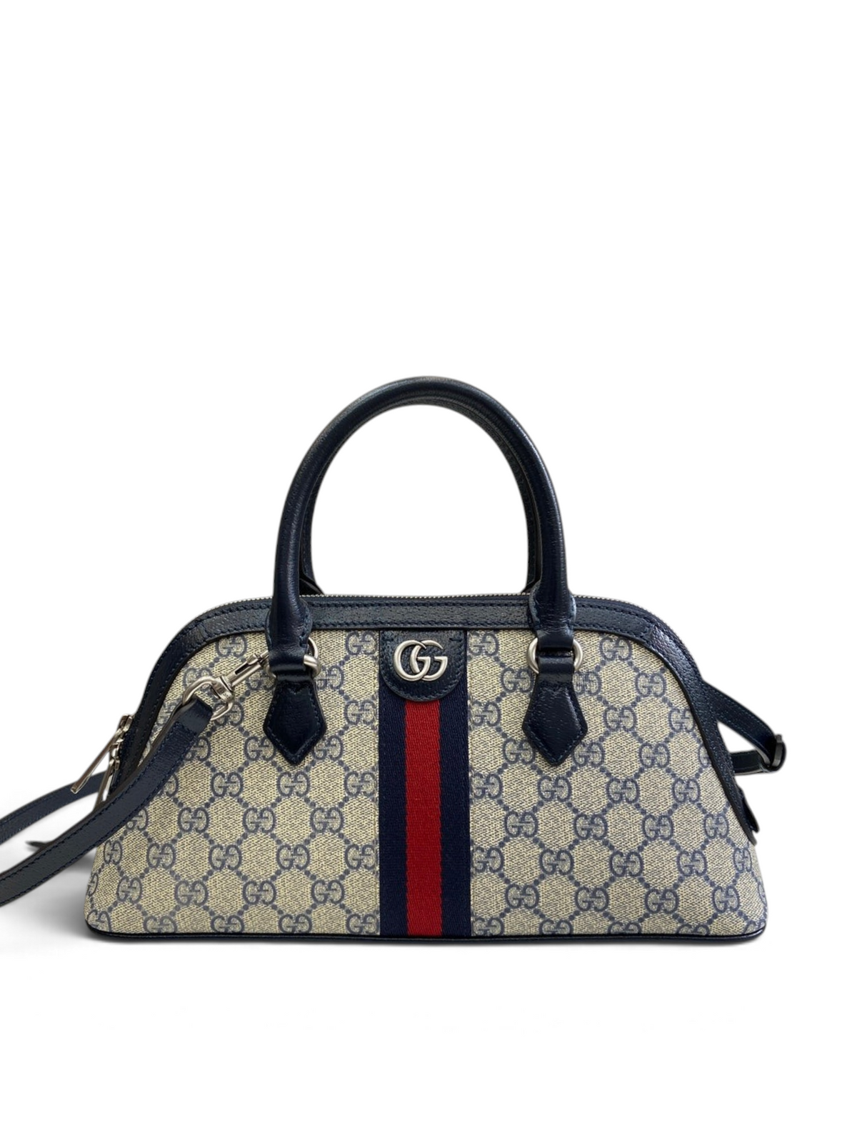 SWORD LUXURY Gucci Ophidia mini çanta, bej GG Supreme kanvas, lacivert deri detaylar ve ikonik kırmızı-mavi Web şeridi.