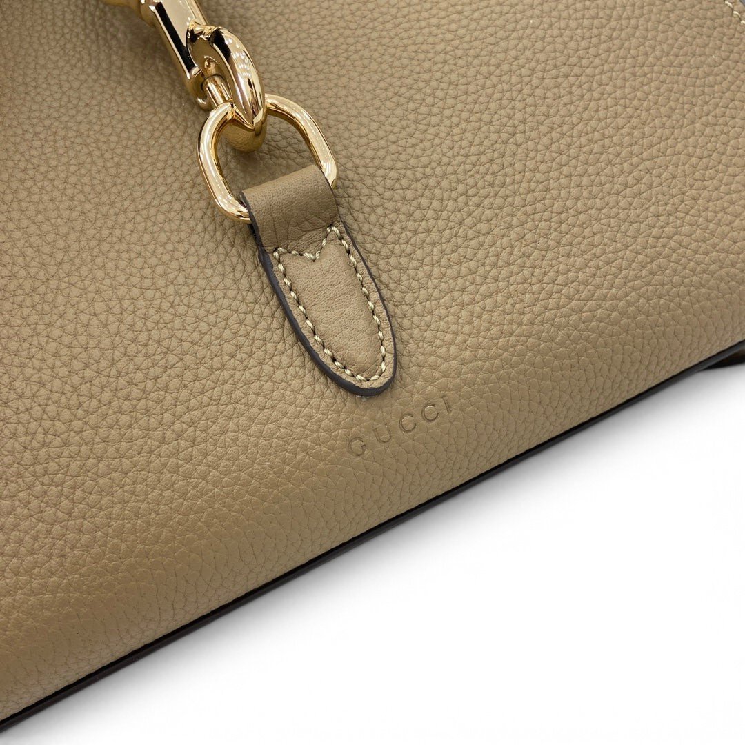 SWORD LUXURY Jackie mini tote çanta, altın tonlu metal detaylı ve dokulu bej vegan deri tasarım.