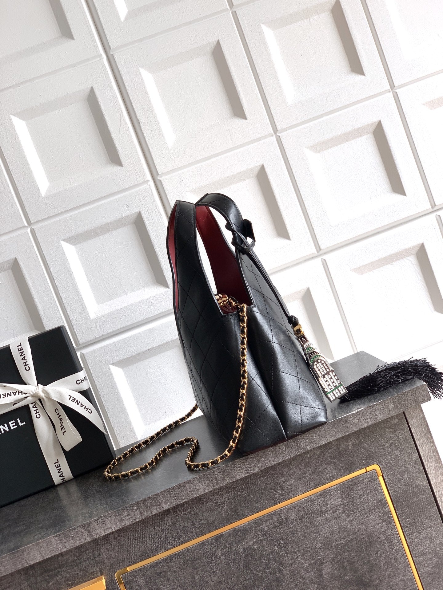 Quilted Leather Triangle Top Handle Bag
