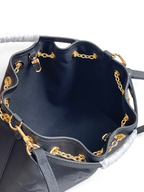 SWORD LUXURY Louis Vuitton Bundle çanta, altın tonlu donanımlı siyah Monogram Empreinte deri iç detay görünümü.