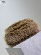 Niki Small in Shearling Bag