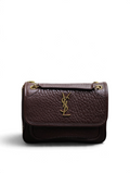 SWORD LUXURY kahverengi taneli deri YSL Niki çanta, altın tonlu monogram detaylı ve zincir askılı şık tasarım.
