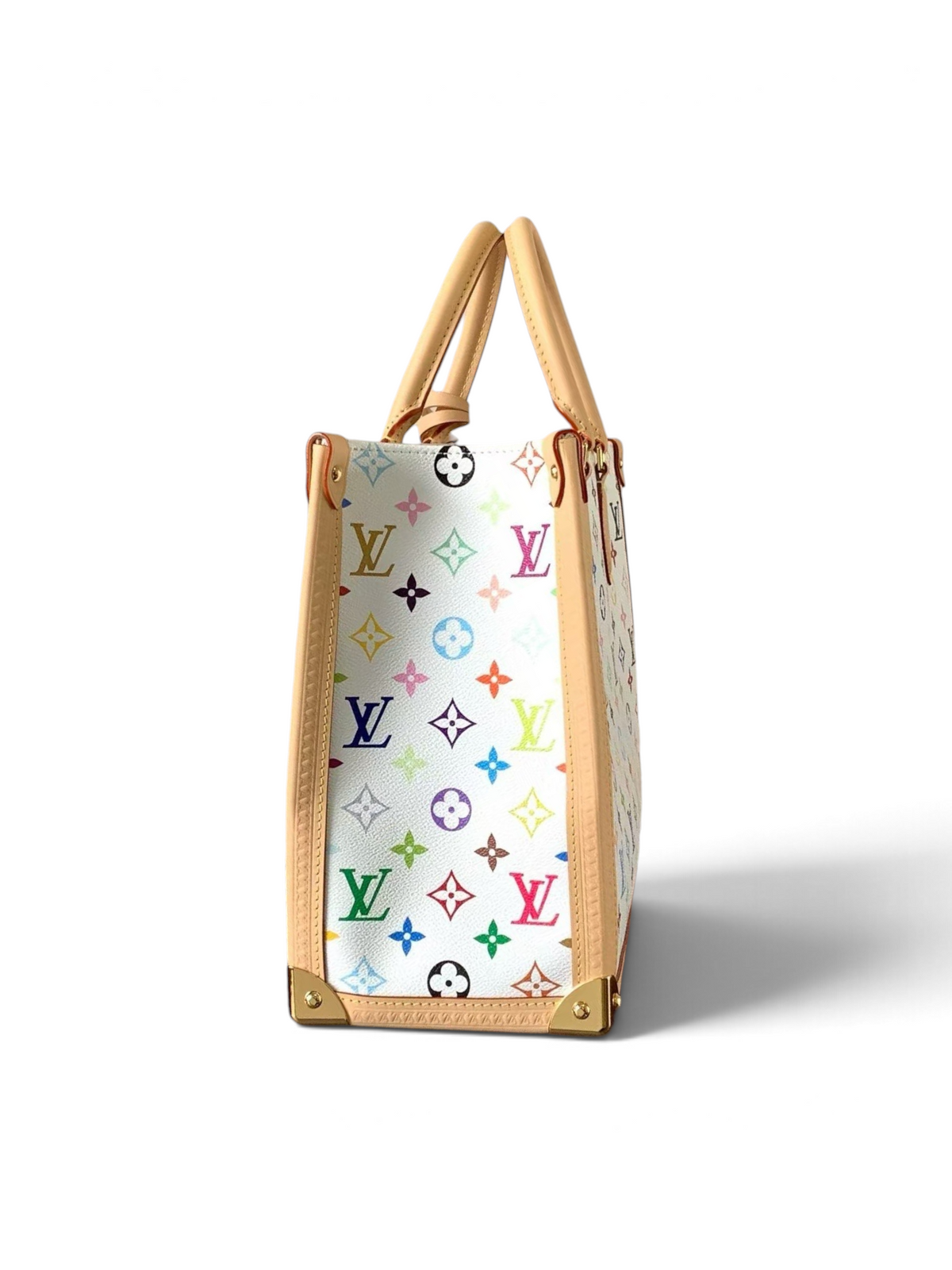 SWORD LUXURY beyaz kanvas üzerine renkli monogram desenli, deri detaylı ve altın donanımlı şık OnTheGo tote çanta.