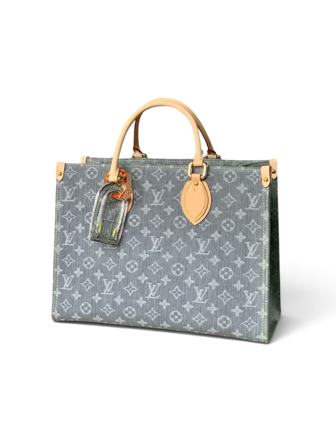 SWORD LUXURY gri monogram desenli denim kanvas OnTheGo MM çanta, doğal deri saplar ve altın tonlu metal detaylar.