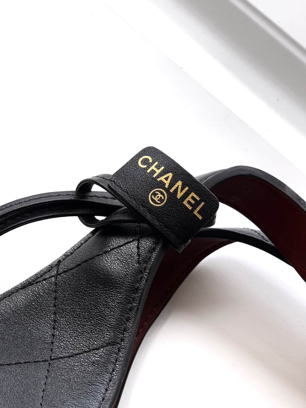 Quilted Leather Triangle Top Handle Bag