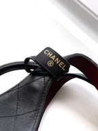 Quilted Leather Triangle Top Handle Bag