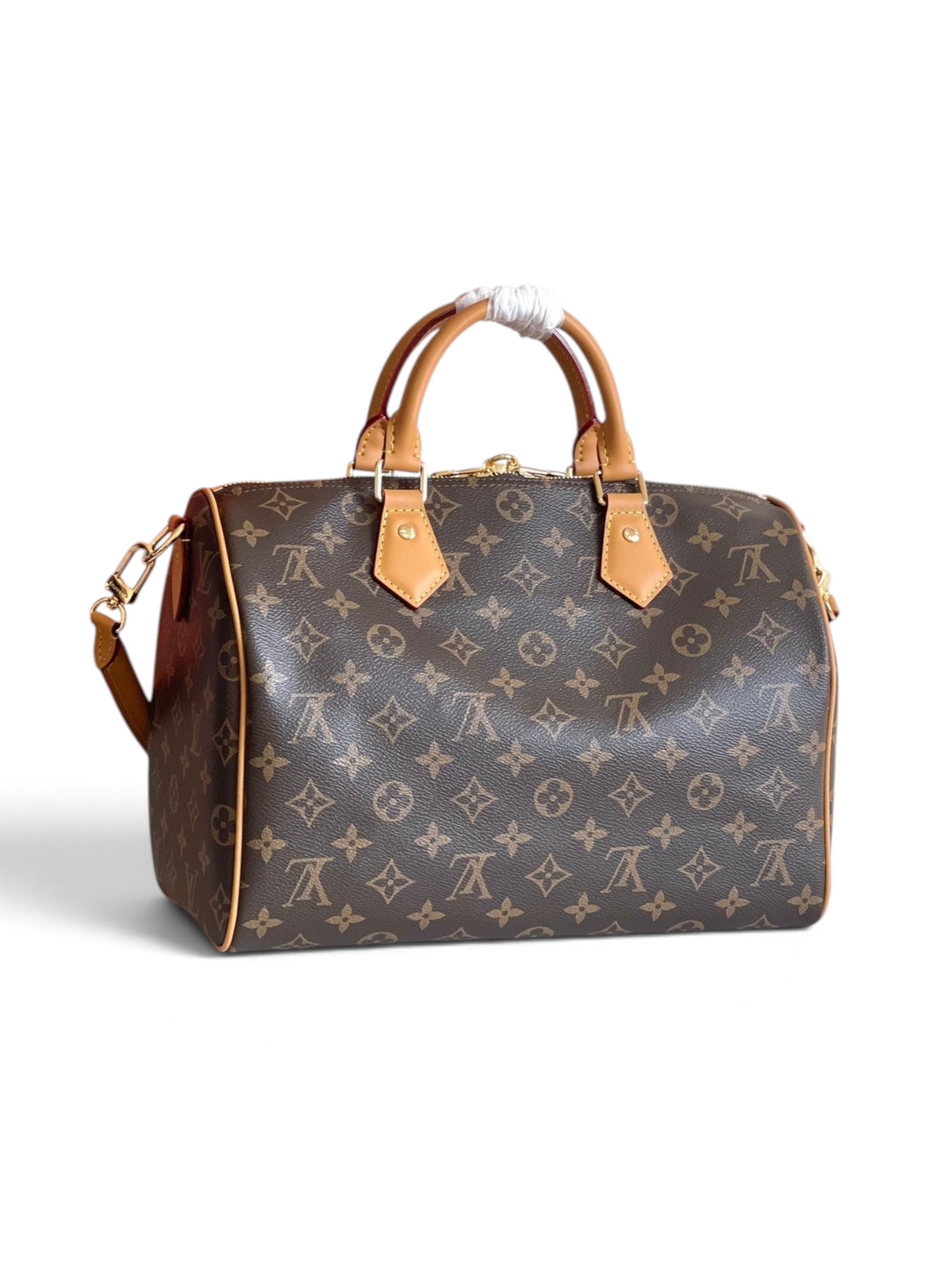 SWORD LUXURY Speedy Bandoulière 30 çanta, ikonik kahverengi monogram kanvas, deri saplar ve gümüş tonlu detaylar.