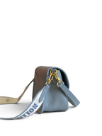 SWORD LUXURY Louis Vuitton Diane çanta, krem rengi Monogram Empreinte deri, altın tonlu donanım ve işlemeli askı.