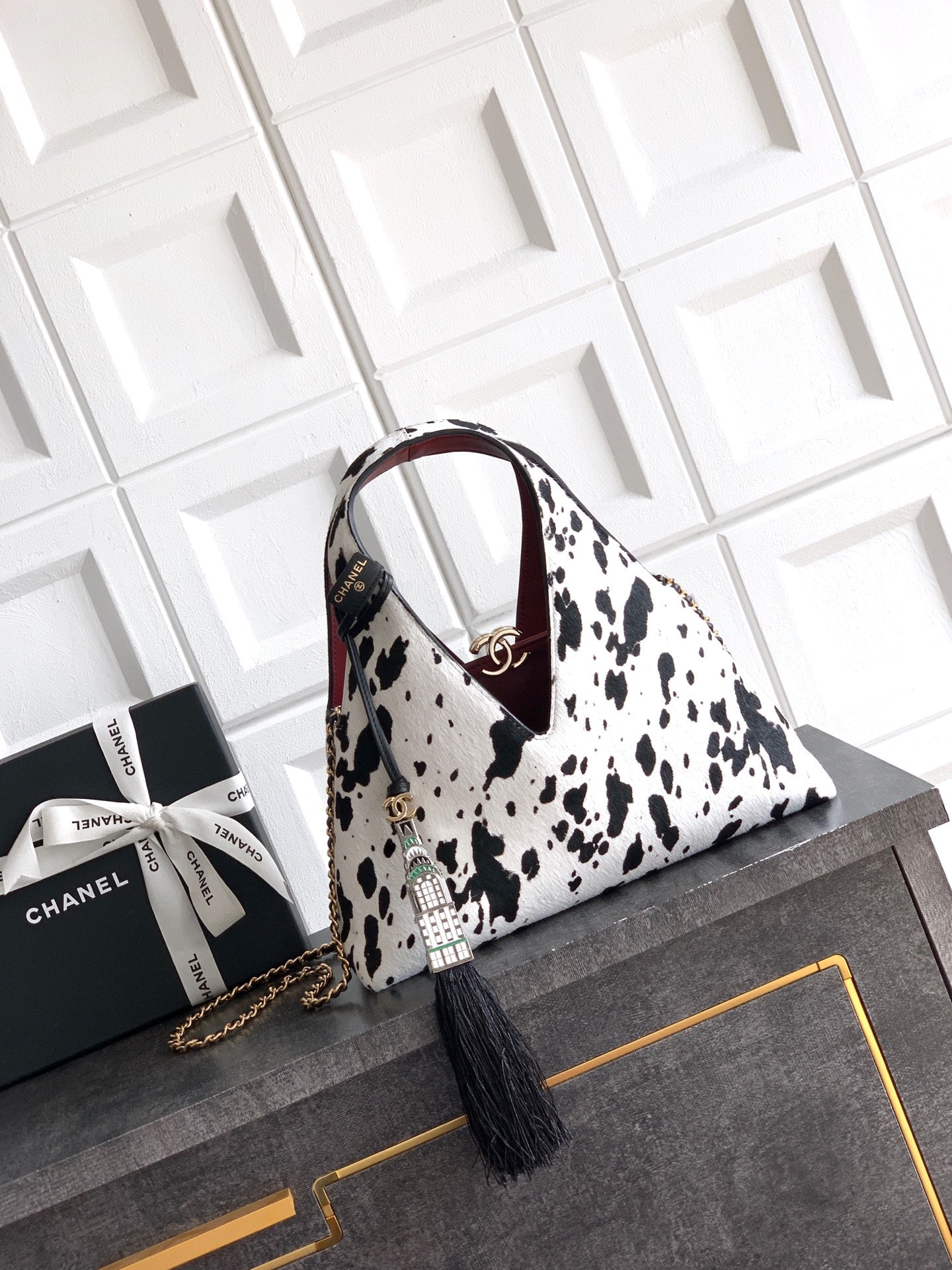 Pony Hair Quilted Triangle Top Handle Bag