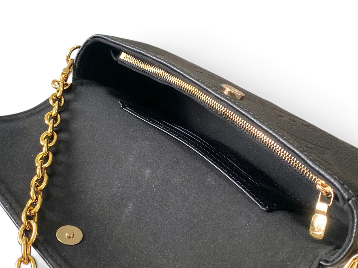 SWORD LUXURY Ivy cüzdan çanta, siyah deri iç kısım, altın zincir askı ve fermuarlı bölme detayları.