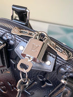 Alma BB Monogram Embossed Leather Handbag