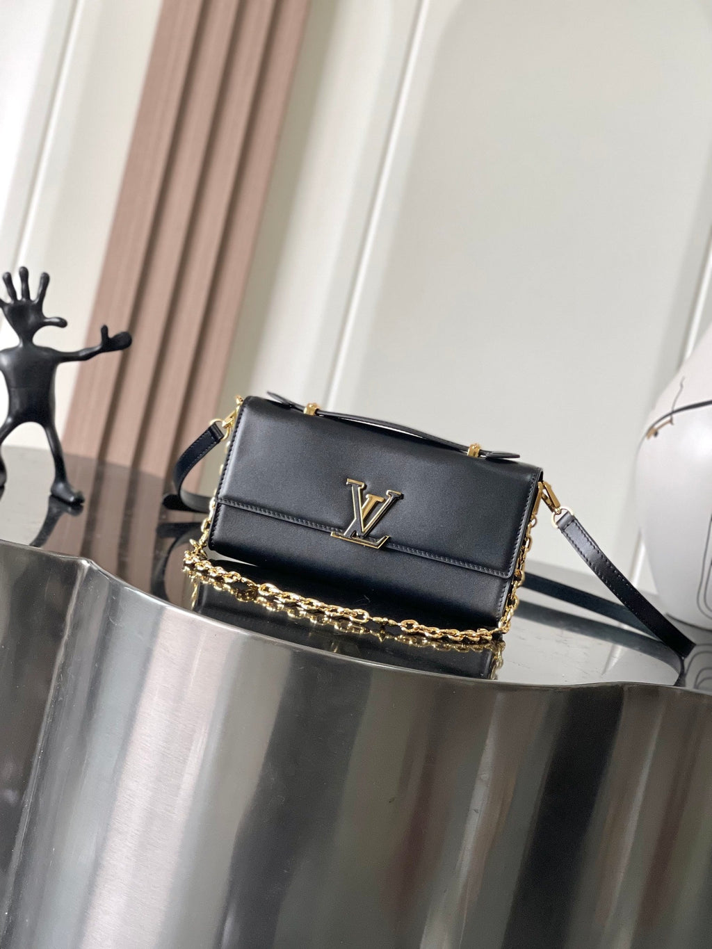 Capucines Wallet On Chain in Black Leather with Gold Chain