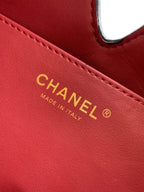 Quilted Leather Triangle Top Handle Bag