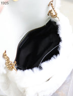 Niki Small in Shearling Bag