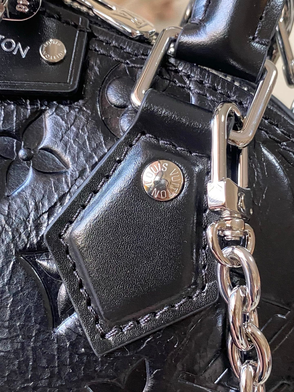 Alma BB Monogram Embossed Leather Handbag