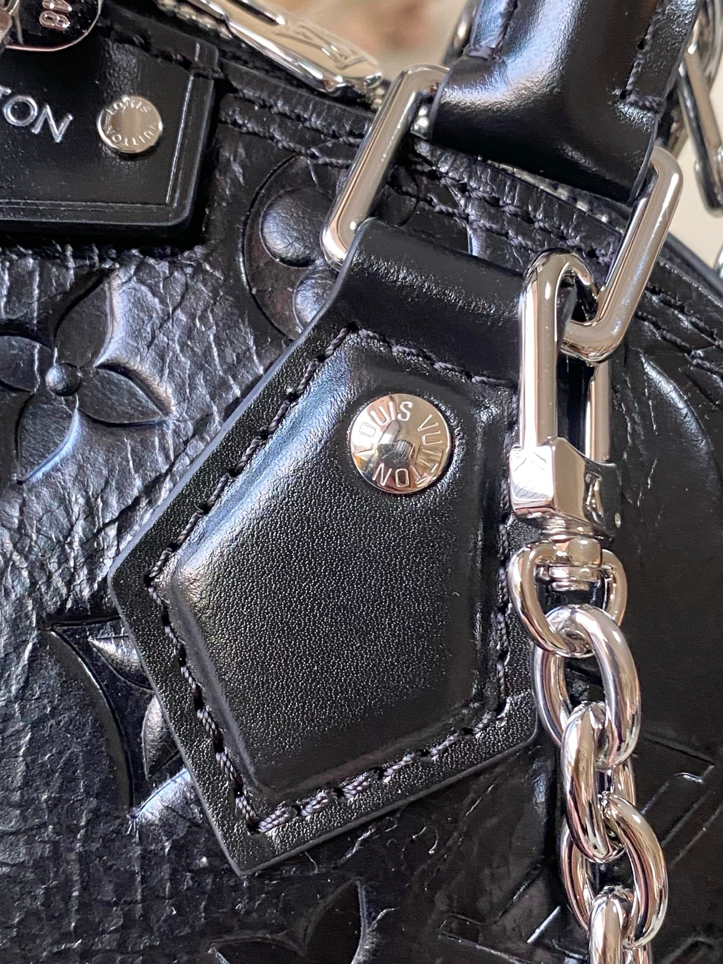 Alma BB Monogram Embossed Leather Handbag