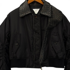 SWORD LUXURY siyah dolgulu naylon bomber ceket, örgü deri yaka detaylı ve fermuarlı ön tasarım.