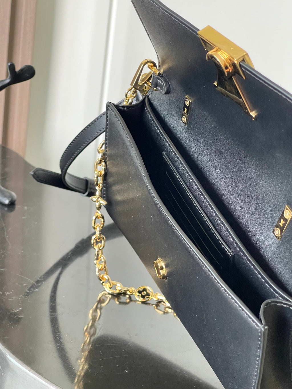 Capucines Wallet On Chain in Black Leather with Gold Chain