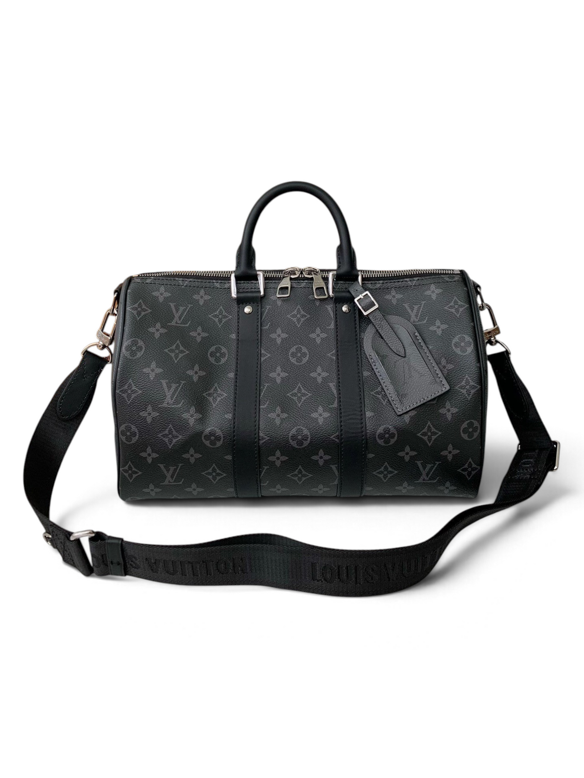 SWORD LUXURY Keepall Bandoulière 35 seyahat çantası, siyah Monogram Eclipse kanvas ve deri detaylı, gümüş donanımlı.