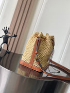 Noé Raffia Bucket Bag with Leather Trim