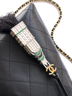 Quilted Leather Triangle Top Handle Bag
