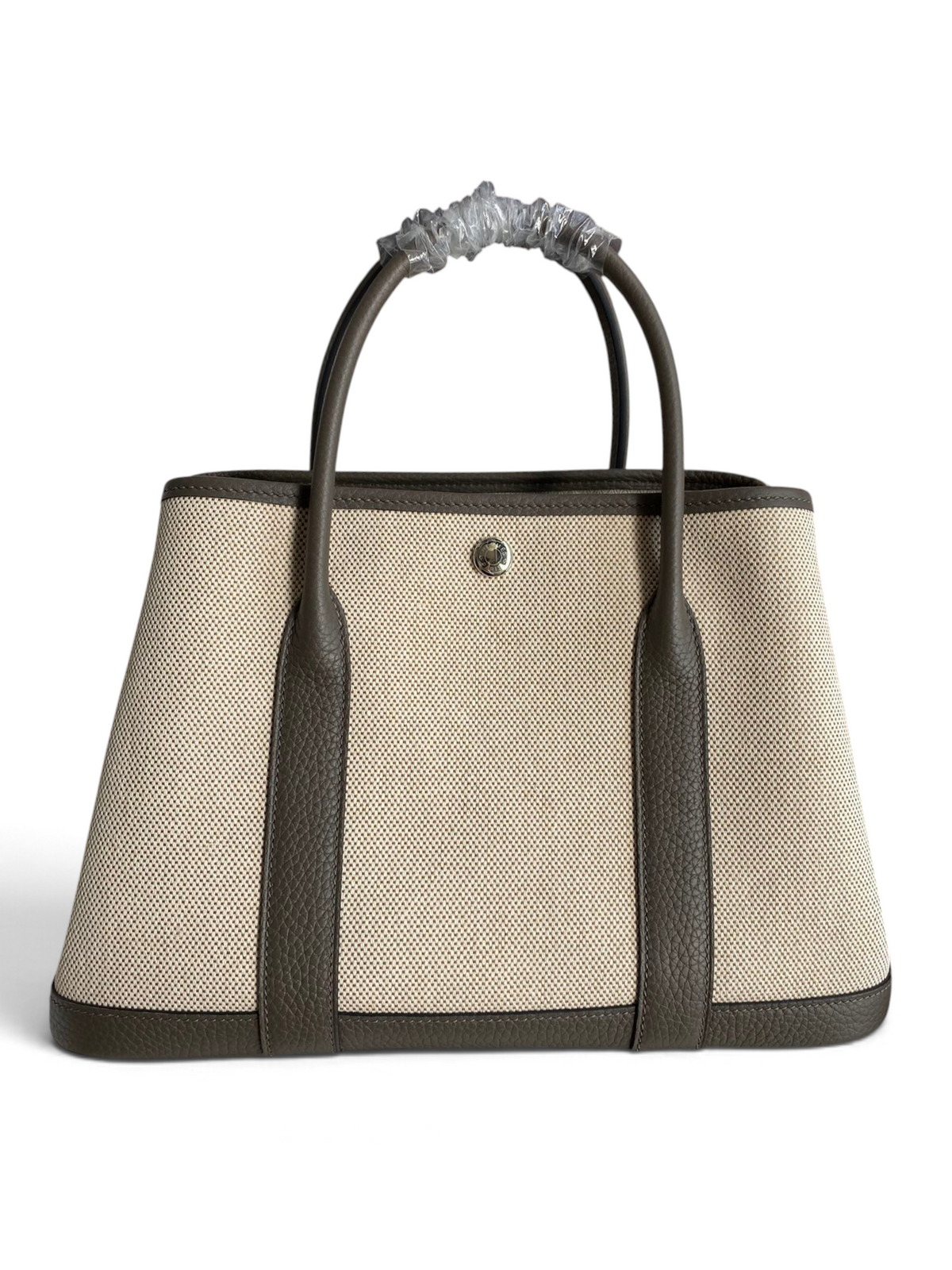 SWORD LUXURY Hermès Garden Party 30 çanta, bej kanvas ve kahverengi deri detaylı, şık ve dayanıklı tasarım.