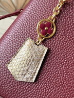 Capucines Mini Python Handle Bag